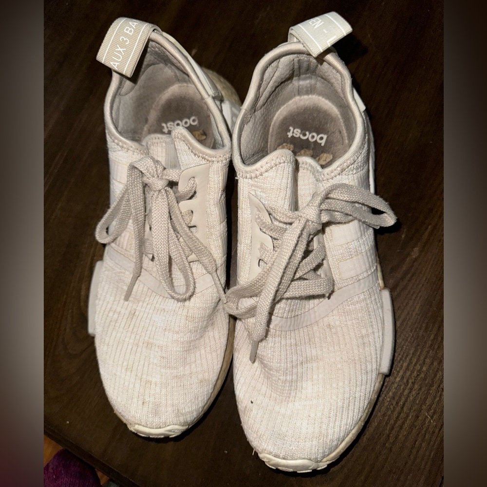 Worn adidas NMDs sneakers